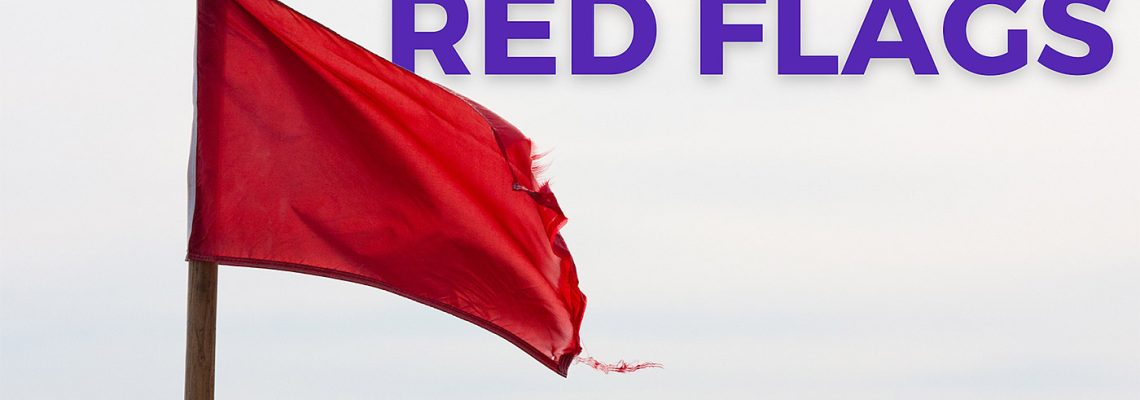 tattered red flag with the words understanding relationship red flags